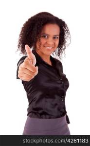 Business woman showing thumb up - selective focus on finger