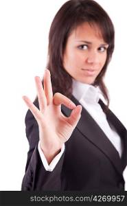 Business woman signaling ok - focus on finger