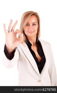 Business woman signaling ok - isolated over white