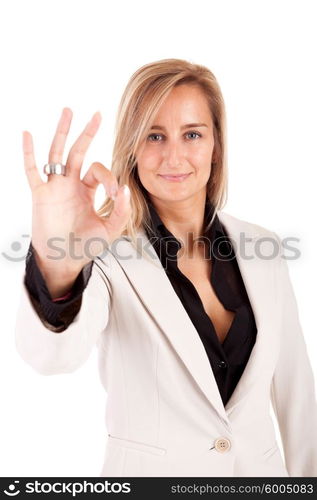 Business woman signaling ok - isolated over white