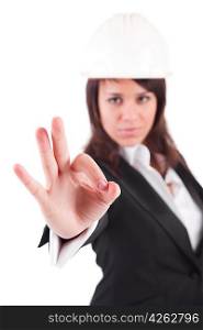 Business woman signaling ok - selective focus on hand