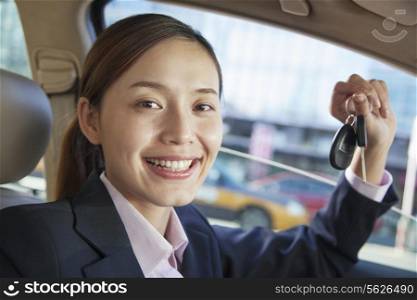 Business Woman Sitting In Car, Showing Keys, Vehicle Interior