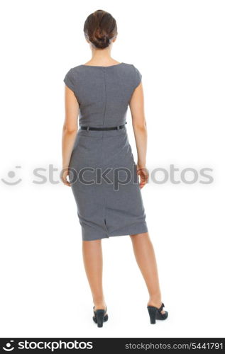 Business woman standing back to camera