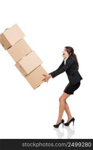 Business woman stumbling with a pile of card boxes on her hands, isolated on white