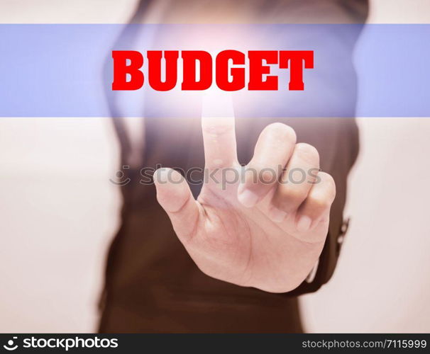 business woman touch BUDGET Text