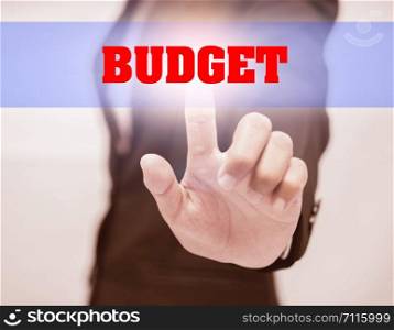 business woman touch BUDGET Text