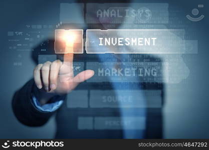 Business woman touching display. Business woman touching virtual display. Business and technology concept