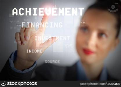 Business woman touching virtual display. Business and technology concept