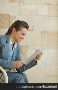 Business woman using tablet PC