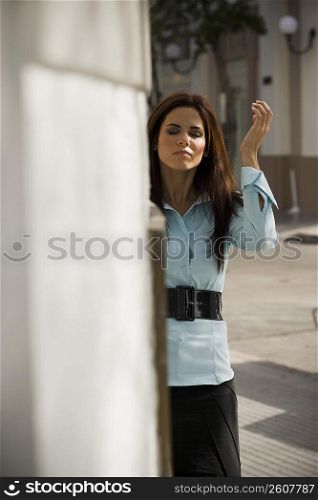 Business woman walking around corner, outdoors