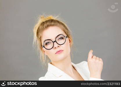 Business woman wearing white jacket and eyeglasses intensive thinking finding great problem solution.. Business woman intensive thinking