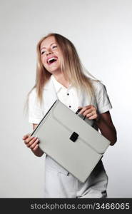 business woman with a briefcase on a gray background