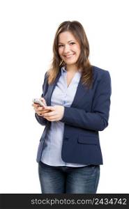 Business woman with a cellphone texting, isolated over white background