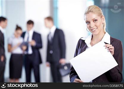 Business woman with a white sheet in the foreground