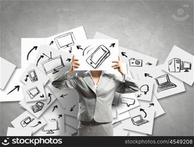 Business woman with board. Image of businesswoman holding message board against face. Conceptual photo