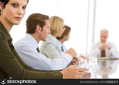 Business woman with colleagues in conference meeting