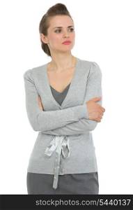 Business woman with crossed arms looking on copy space