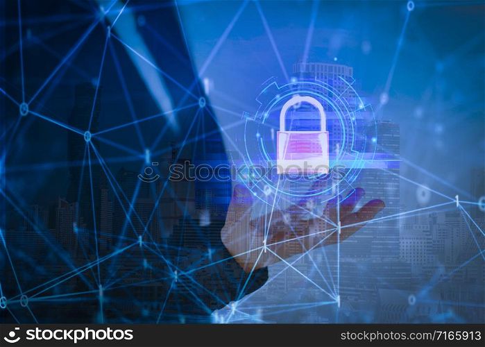 Business woman with data security systems computer with locked padlock on data network for protect crime by an anonymous hacker internet / technology background cyber security concept