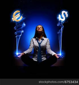 Business woman with financial symbols around