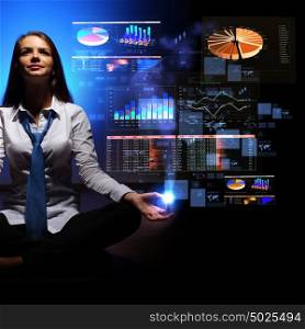 Business woman with financial symbols around. Businesswoman with financial symbols around her on the background