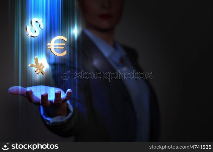 Business woman with financial symbols around. Businesswoman with financial symbols coming from her hand