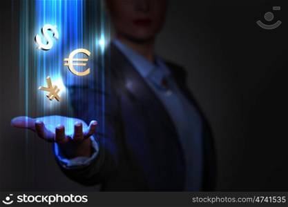 Business woman with financial symbols around. Businesswoman with financial symbols coming from her hand