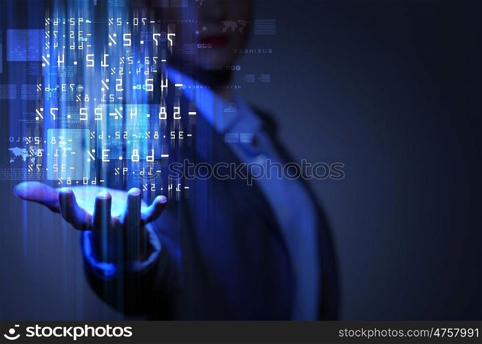 Business woman with financial symbols around. Businesswoman with financial symbols coming from her hand