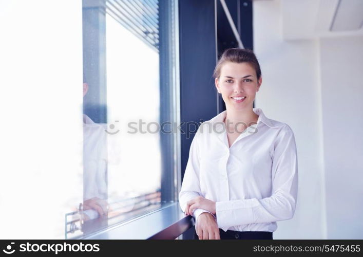 business woman with her staff, people group in background at modern bright office indoors