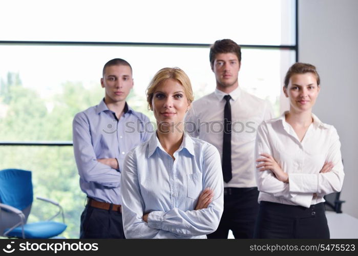 business woman with her staff, people group in background at modern bright office indoors