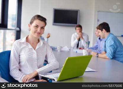 business woman with her staff, people group in background at modern bright office indoors