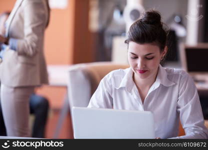 business woman with her staff, people group in background at modern bright office indoors