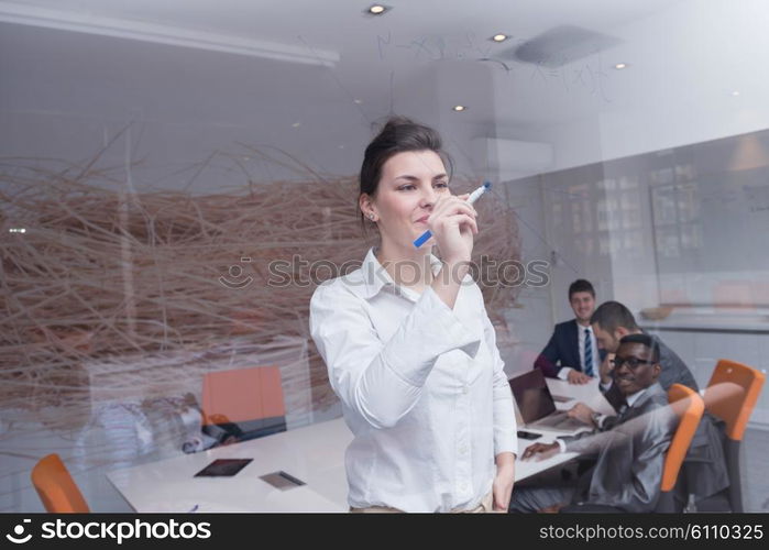 business woman with her staff, people group in background at modern bright office indoors