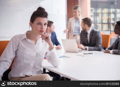 business woman with her staff, people group in background at modern bright office indoors