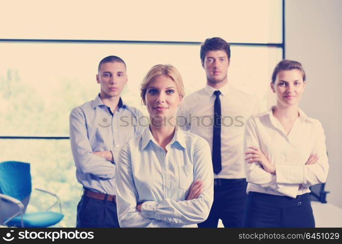 business woman with her staff, people group in background at modern bright office indoors