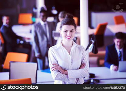 business woman with her staff, people group in background at modern bright office indoors