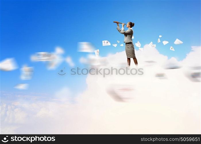 Business woman with telescope. Image of businesswoman looking in telescope standing atop of cloud