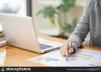 Business Woman working by using laptop computer Hands typing on a keyboard. Professional investor working new start up project. business planning in office. Technology business Concept