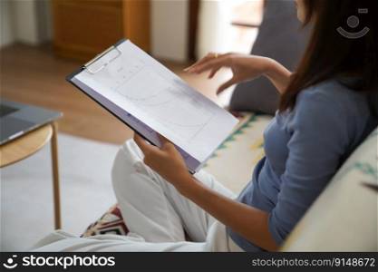 Business woman working from home.
Financial problems Home work space concept.