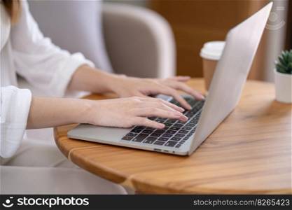 Business woman working from home. work online on laptop. Asian businesswoman working on sofa online business with social distancing laptop online meeting