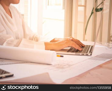 business woman working in office with laptop