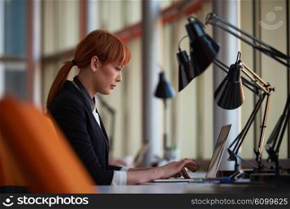 business woman working on computer at modern office