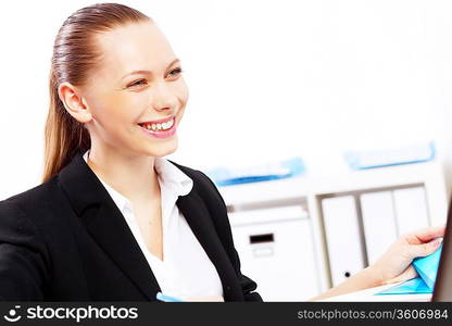 Business woman working on computer in office