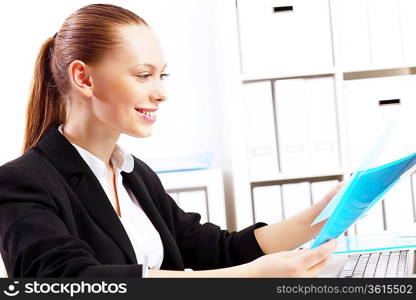 Business woman working on computer in office