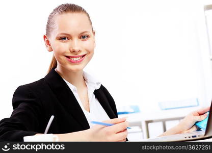 Business woman working on computer in office