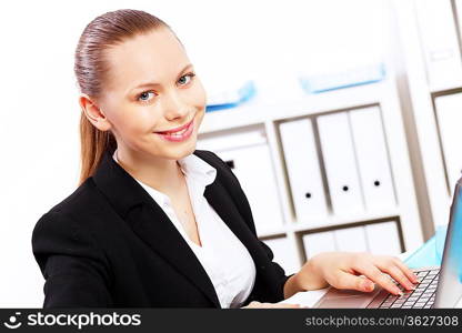 Business woman working on computer in office