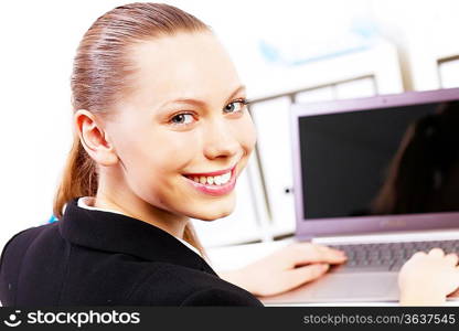 Business woman working on computer in office