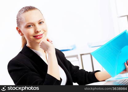 Business woman working on computer in office