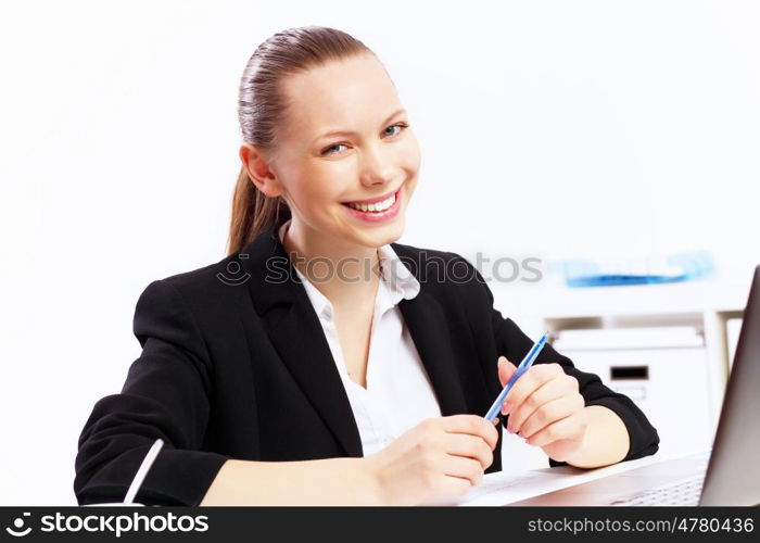 Business woman working on computer in office