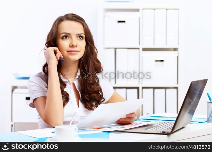 Business woman working on computer in office