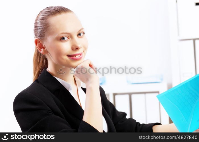 Business woman working on computer in office